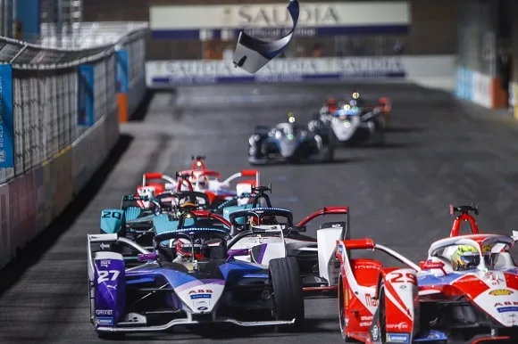 Part of the car of Jake Dennis (GBR) BMW I Andretti Motorsport, BMW iFE.21, flies into the air as he battles with Alexander Sims (GBR) Mahindra Racing, M7Electro