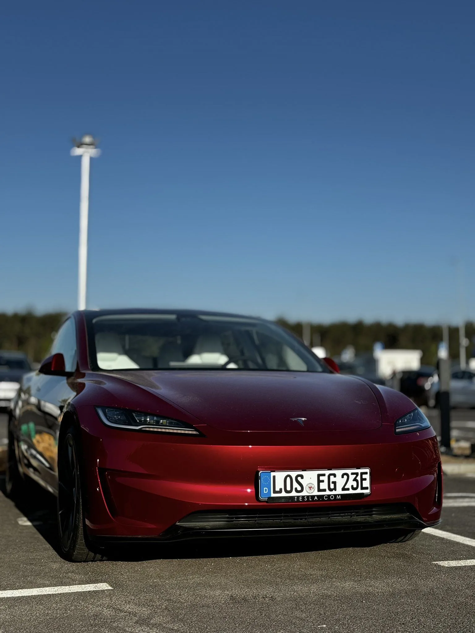 Tesla Model 3 Performance rouge