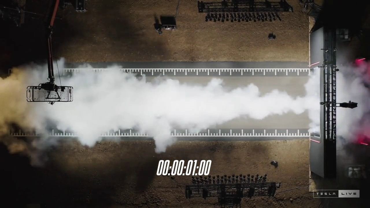 Vue du dessus de l'essai d'accélération du Tesla Roadster, chronomètre affichant une seconde