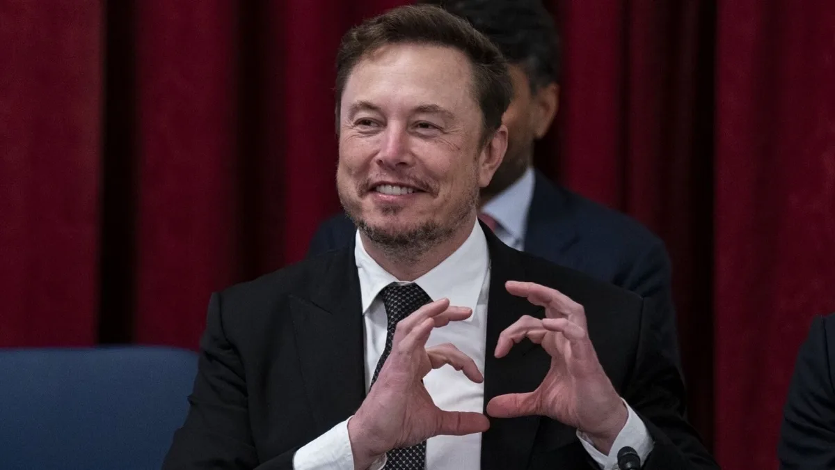 Elon Musk makes a heart with his hands during a Senate bipartisan Artificial Intelligence (Al) Insight Forum on Capitol Hill in Washington, DC, US