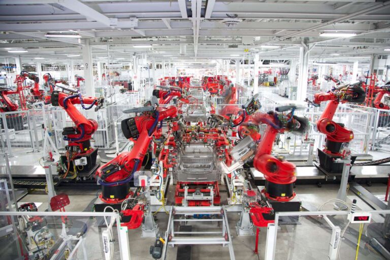 Enter the Tesla Motors factory in Fremont.